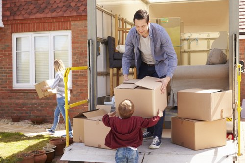 Loading furniture into a local removals van in Penge