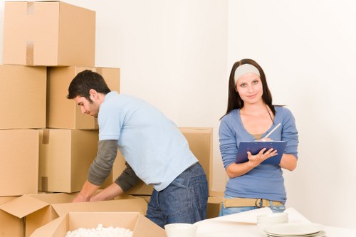 Boxes and furniture prepared for a local house move in Penge