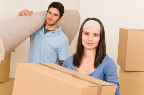 Packing boxes and household items ready for a Penge relocation